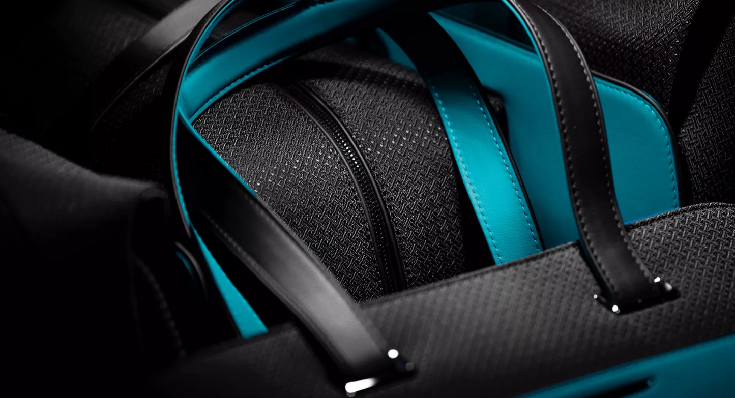 BLACK BADGE ESCAPISM LUGGAGE COLLECTION