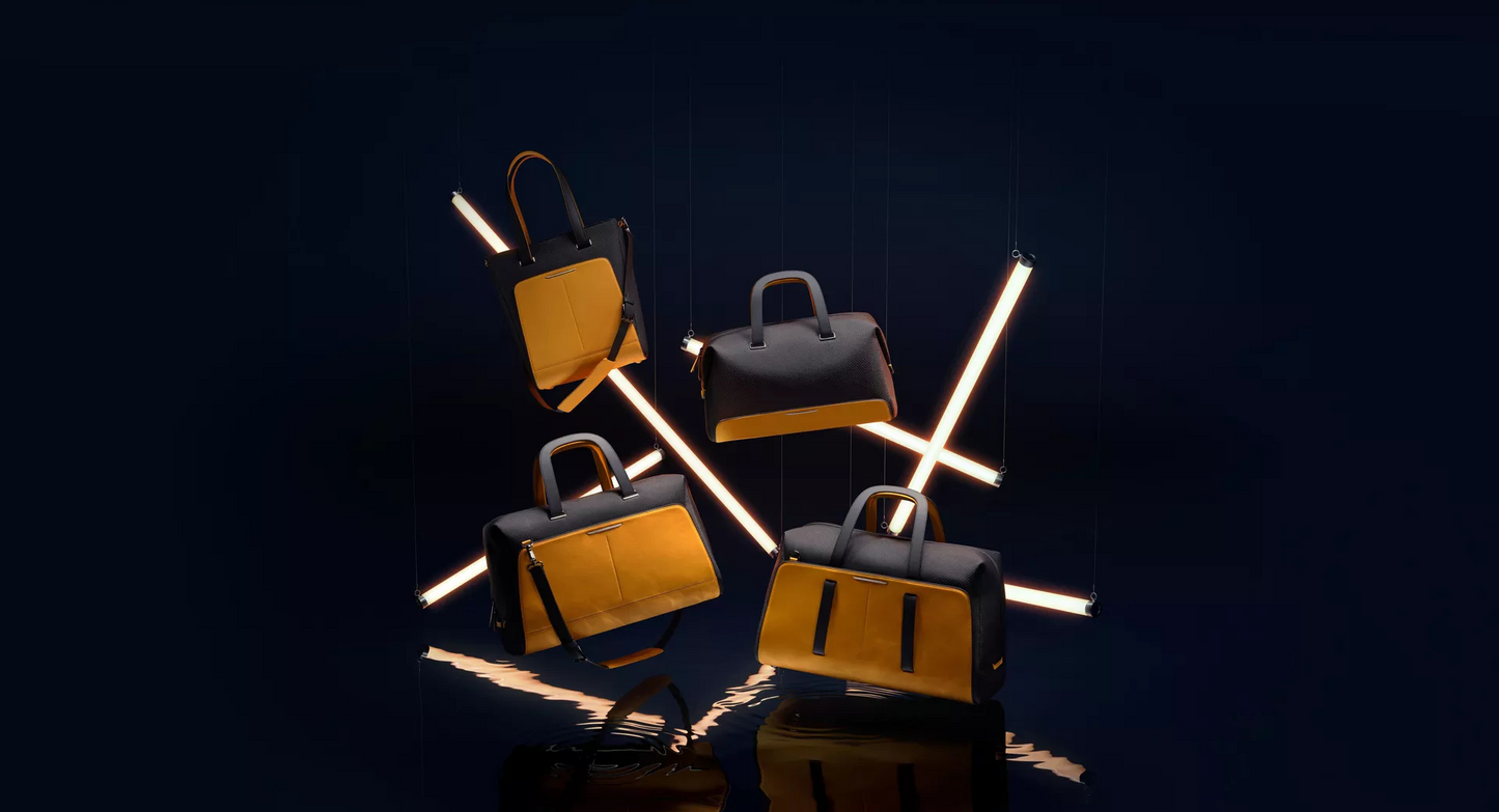 BLACK BADGE ESCAPISM LUGGAGE COLLECTION